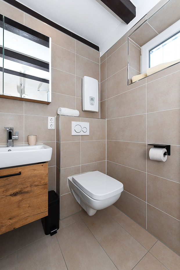 Ferienhaus „Lammertshörn 51“ - Badezimmer