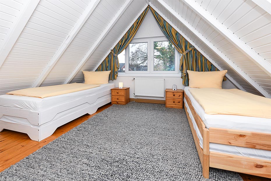 Ferienhaus „Lammertshörn 51“ - Schlafzimmer 2/Kinderzimmer