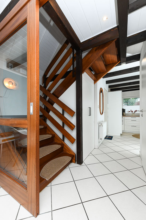 Ferienhaus „Lammertshörn 51“ - Treppe ins Obergeschoss