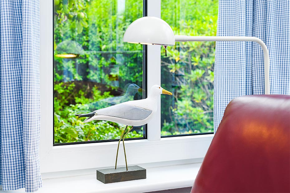 Ferienwohnung „Strandrose“ - Wohnzimmer mit integriertem Küchenbereich