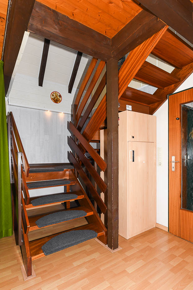 Ferienhaus „Leuchtturm“ - Wohnzimmer mit integriertem Küchenbereich