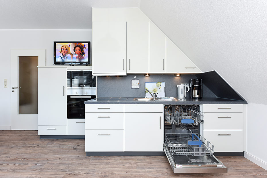 Ferienwohnung „oben mitte“ - Wohnzimmer mit integriertem Küchenbereich