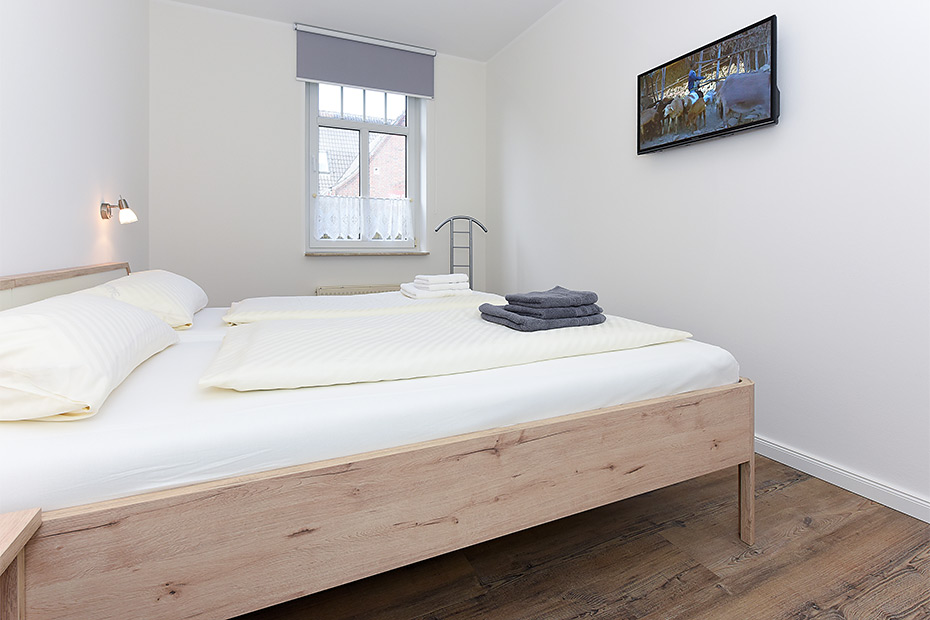 Ferienwohnung „unten mitte“ - Schlafzimmer 1