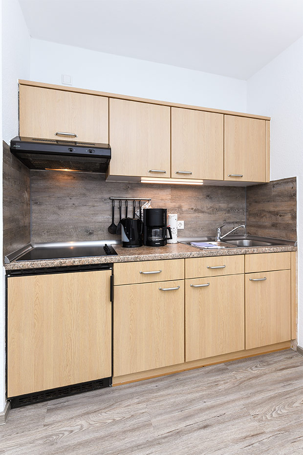 Ferienwohnung „Scholle“ - Wohnraum mit integrierter Küche