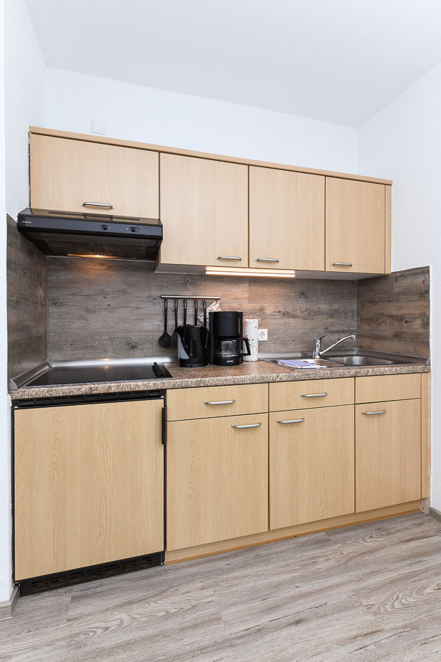 Ferienwohnung „Scholle“ - Wohnraum mit integrierter Küche