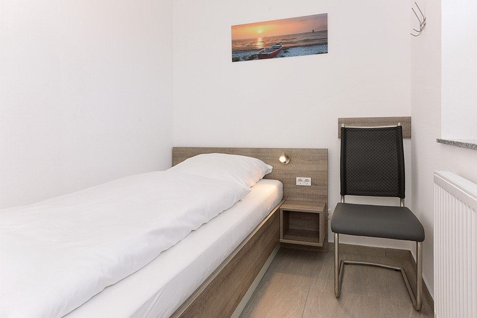 Ferienhaus „Deichgraf 1“ - Schlafzimmer 2/Kinderzimmer