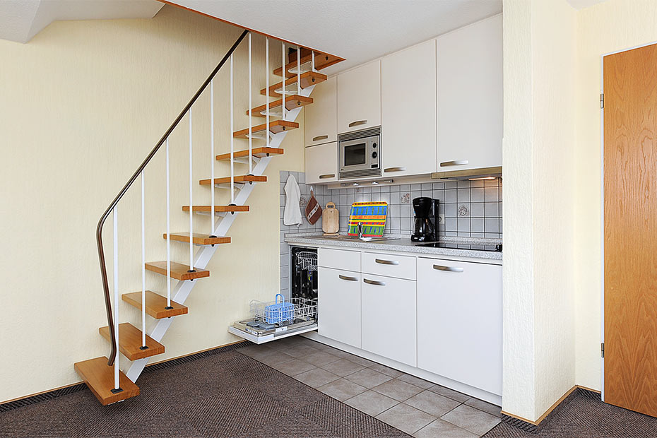 Ferienwohnung „Langeoog“ - Wohnzimmer mit integriertem Küchenbereich