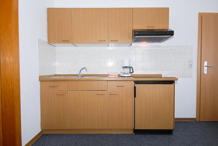 Ferienwohnung 2 - Wohnzimmer mit integriertem Küchenbereich