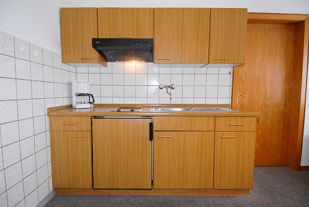 Ferienwohnung 6 - Wohnzimmer mit integriertem Küchenbereich