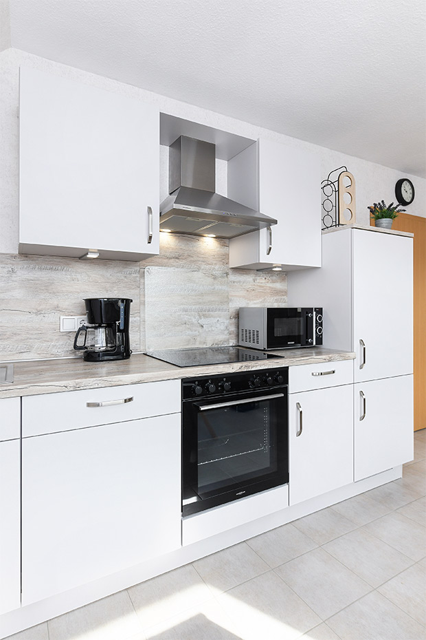 Ferienwohnung - Wohnzimmer mit integriertem Küchenbereich