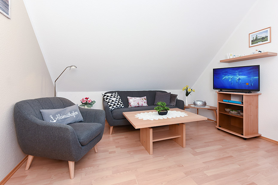 Ferienwohnung „Nord“ - Wohnzimmer mit integriertem Küchenbereich