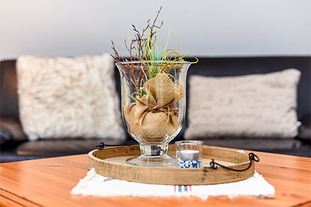 Ferienwohnung „Wattwürmchen“ - Wohnzimmer mit integriertem Küchenbereich