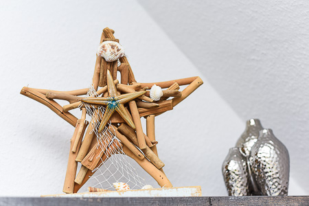 Ferienwohnung „Wattwürmchen“ - Wohnzimmer mit integriertem Küchenbereich