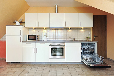 Ferienwohnung „Flut“ - Wohnzimmer mit integriertem Küchenbereich