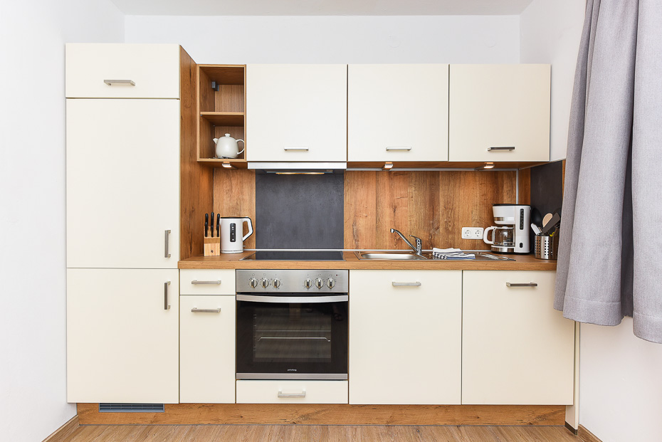 Ferienwohnung „Ebbe“ - Wohnzimmer mit integriertem Küchenbereich