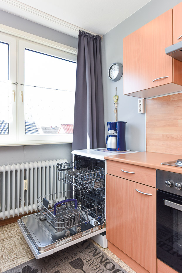 Ferienwohnung „Wind“ - Wohnzimmer mit integriertem Küchenbereich