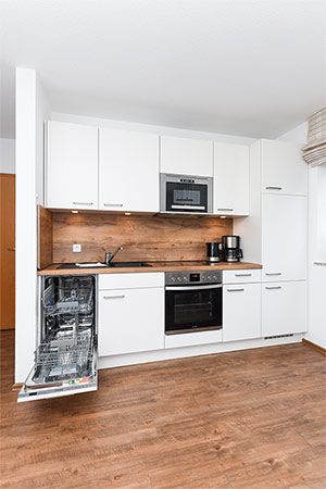 Ferienwohnung - Wohnzimmer mit integriertem Küchenbereich