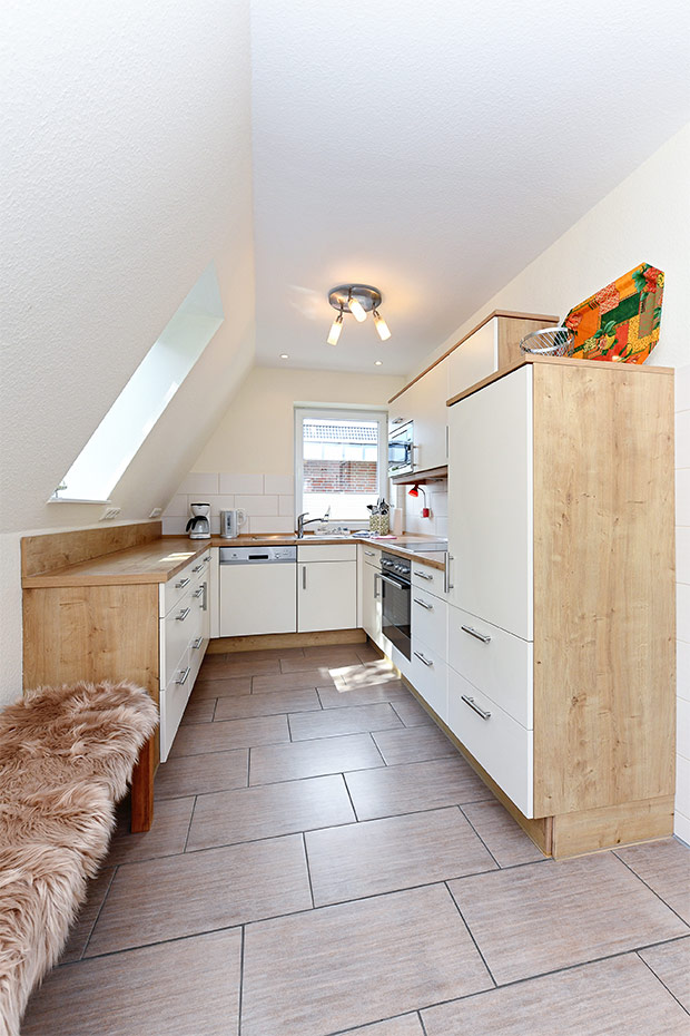 Ferienhaus „Nixe“ - Wohnzimmer mit integriertem Küchenbereich