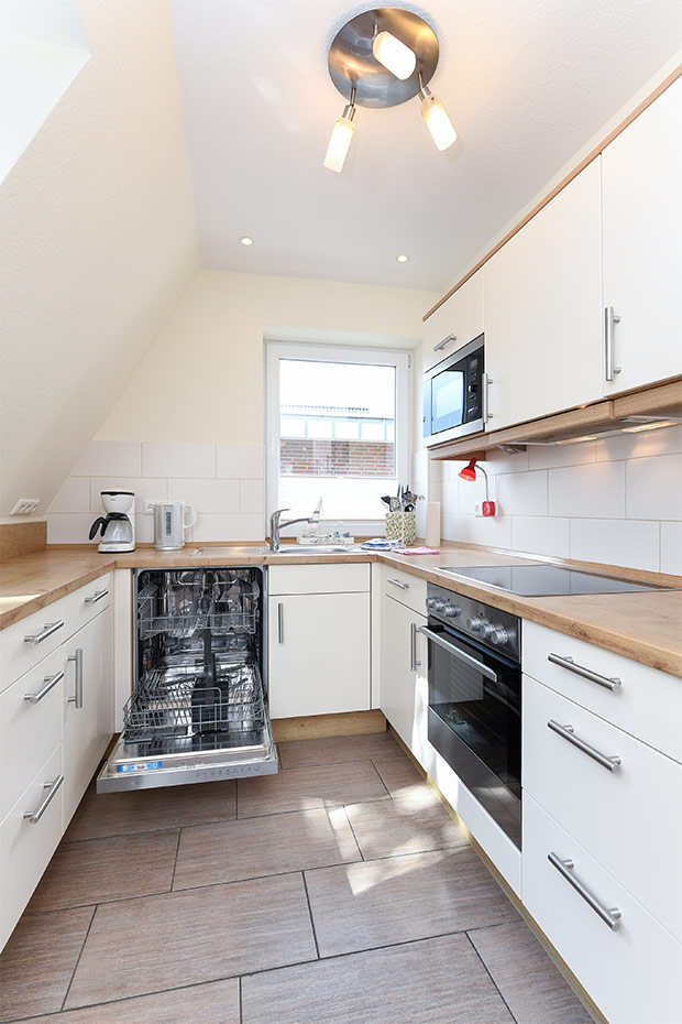 Ferienhaus „Nixe“ - Wohnzimmer mit integriertem Küchenbereich