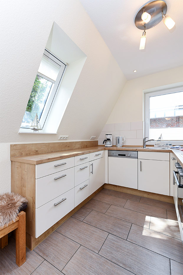 Ferienhaus „Nixe“ - Wohnzimmer mit integriertem Küchenbereich