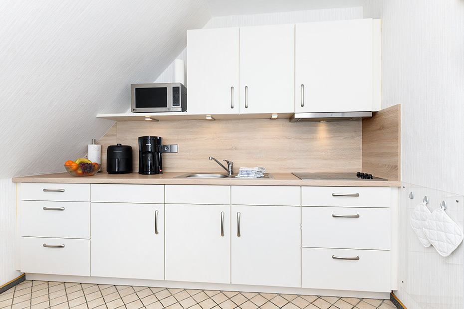 Ferienwohnung 2 - Wohnzimmer mit integriertem Küchenbereich