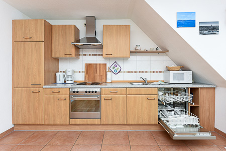 Ferienwohnung 1 - Wohnzimmer mit integriertem Küchenbereich