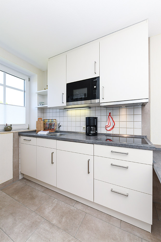 Ferienwohnung 1 - Wohnzimmer mit integriertem Küchenbereich