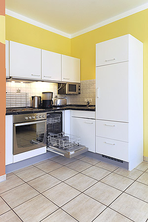 Ferienwohnung 1 - Wohnzimmer mit integriertem Küchenbereich