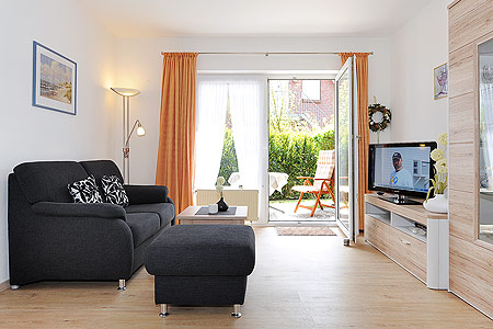 Ferienwohnung 1 - Wohnzimmer mit integriertem Küchenbereich