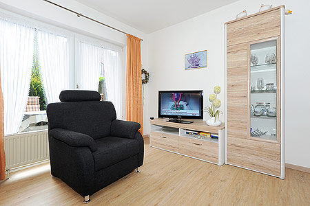 Ferienwohnung 1 - Wohnzimmer mit integriertem Küchenbereich