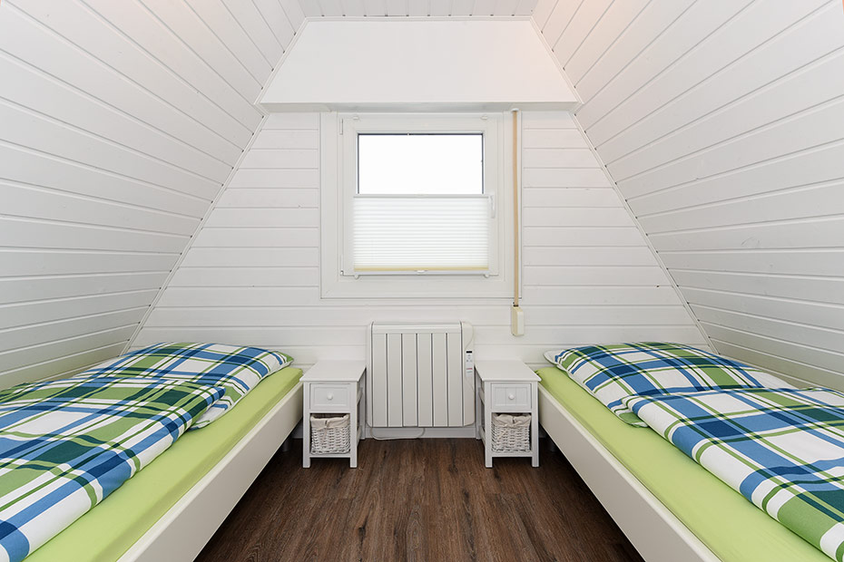 Ferienhaus „Wattwurm“ - Schlafzimmer 2/Kinderzimmer