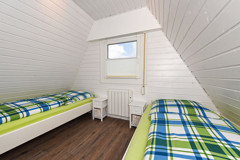 Ferienhaus „Wattwurm“ - Schlafzimmer 2/Kinderzimmer