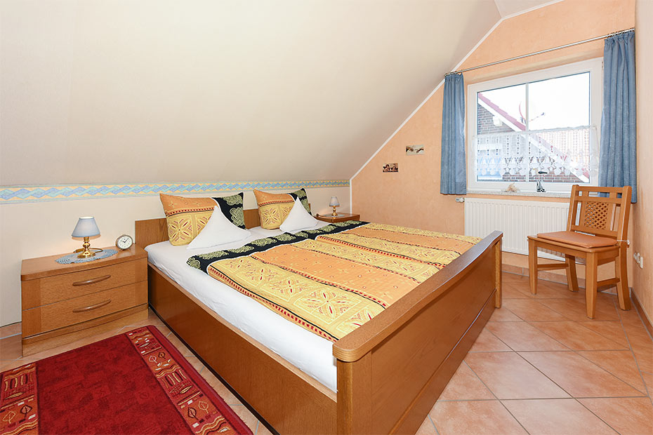 Ferienwohnung „Huus Twalf“ - Schlafzimmer