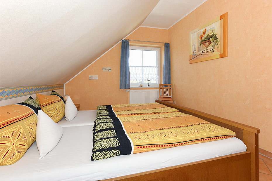Ferienwohnung „Huus Twalf“ - Schlafzimmer