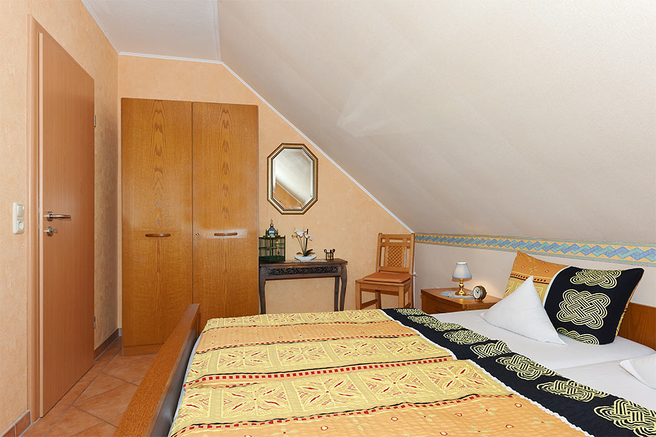 Ferienwohnung „Huus Twalf“ - Schlafzimmer