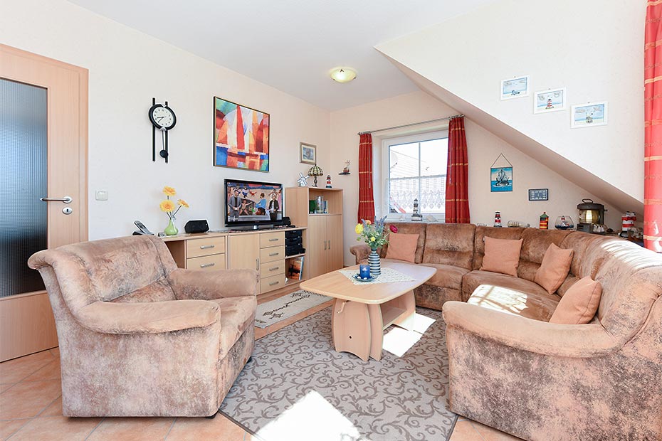 Ferienwohnung „Huus Twalf“ - Wohnzimmer