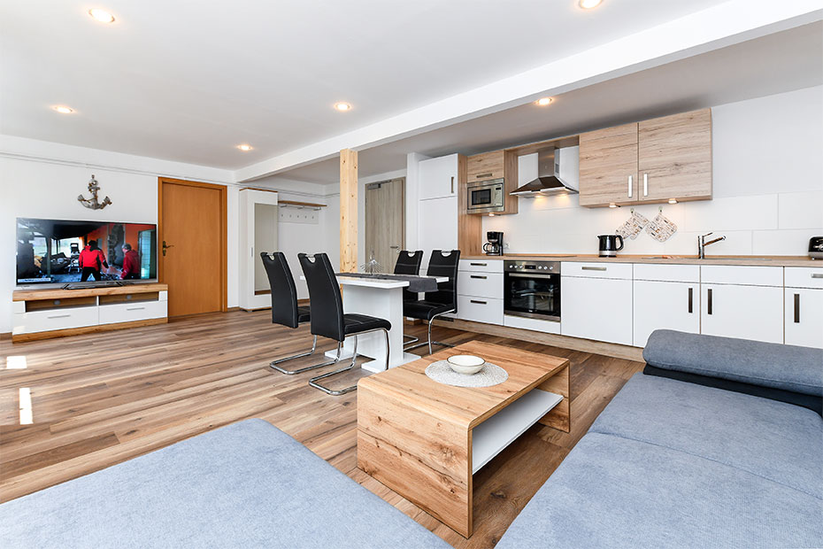Ferienwohnung 3 - Wohnzimmer mit integriertem Küchenbereich