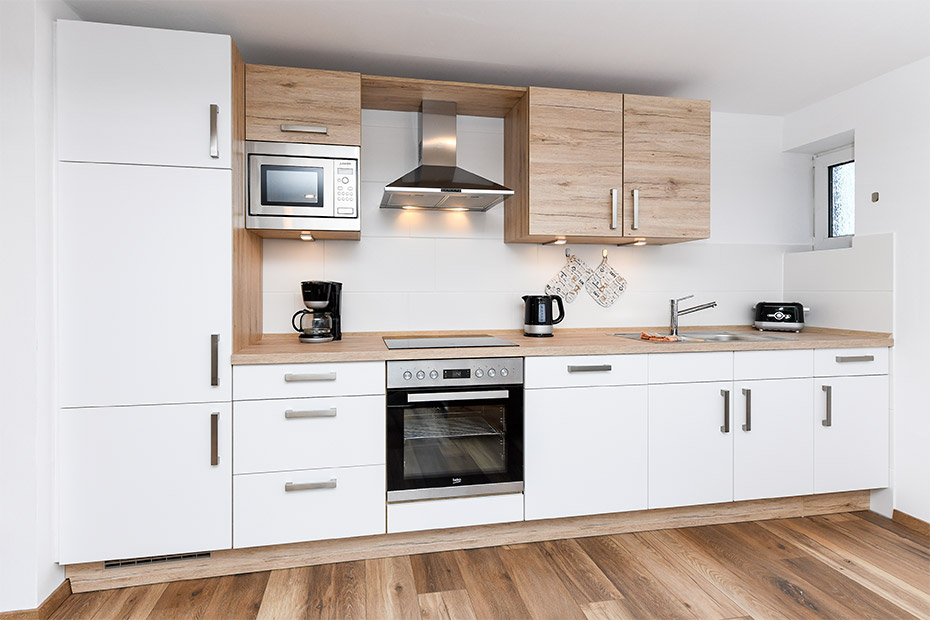 Ferienwohnung 3 - Wohnzimmer mit integriertem Küchenbereich