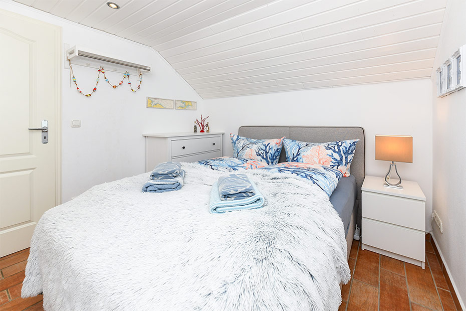 Ferienhaus „Sternenklar“ - Schlafzimmer 2/Kinderzimmer