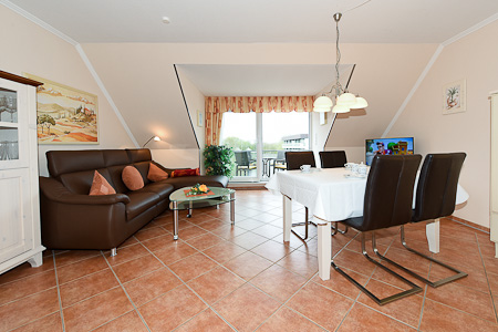 Ferienwohnung „Padua“ - Wohnzimmer mit integriertem Küchenbereich