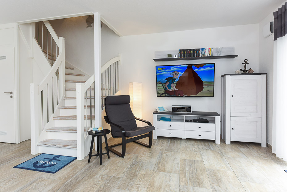 Ferienhaus „Ankerhuus“ - Wohnzimmer mit integriertem Küchenbereich