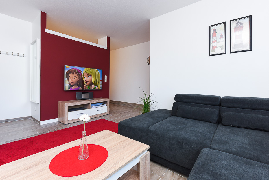 Ferienwohnung „Baltrum“ - Wohnzimmer mit integriertem Küchenbereich