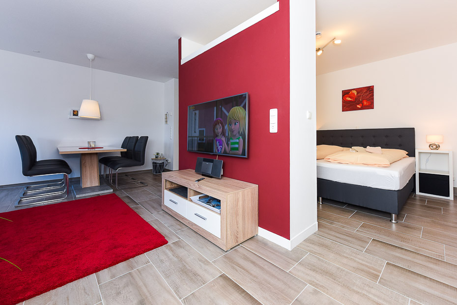 Ferienwohnung „Baltrum“ - Wohnzimmer mit integriertem Küchenbereich