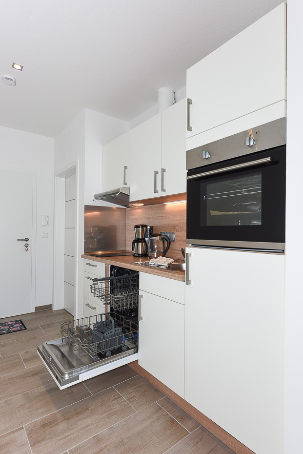 Ferienwohnung „Baltrum“ - Wohnzimmer mit integriertem Küchenbereich