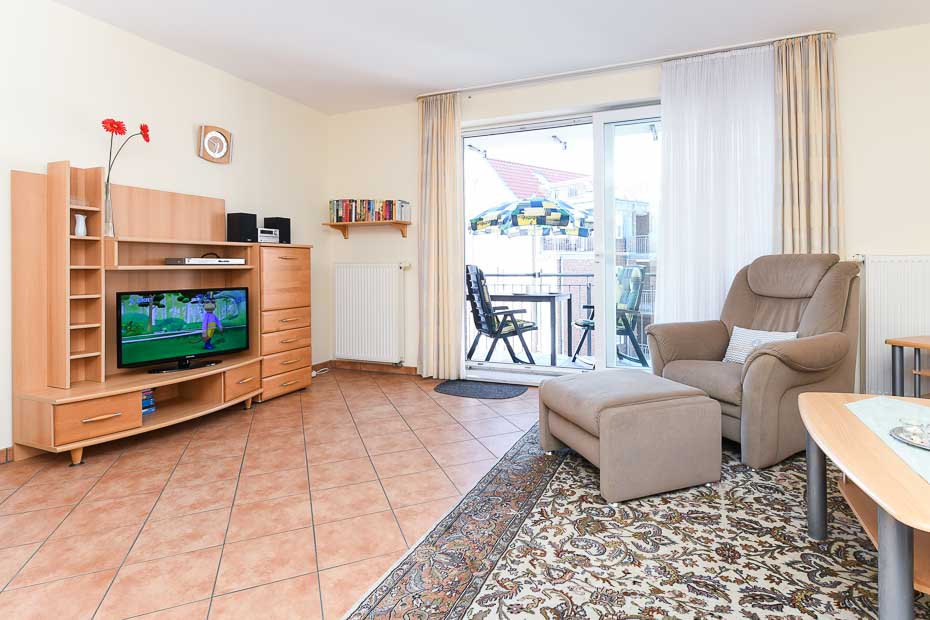 Ferienwohnung „W'ooge“ - Wohnzimmer mit integriertem Küchenbereich