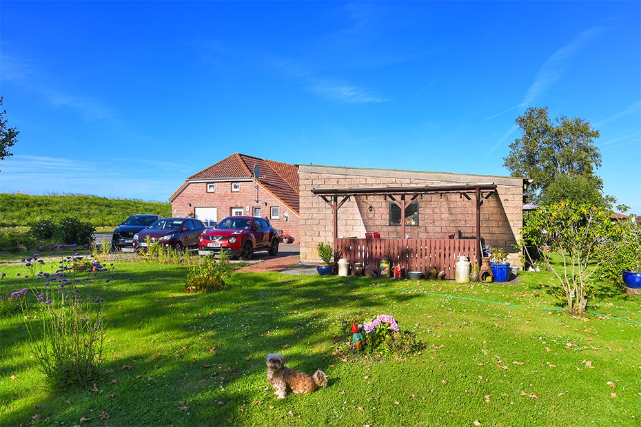 Ferienwohnung „Seestern“ - Außensicht mit überdachte Terrasse