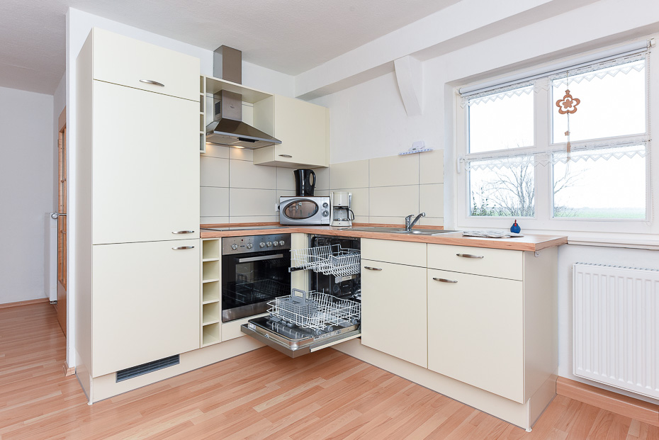 Ferienwohnung „Heuboden“ - Wohnzimmer mit integriertem Küchenbereich