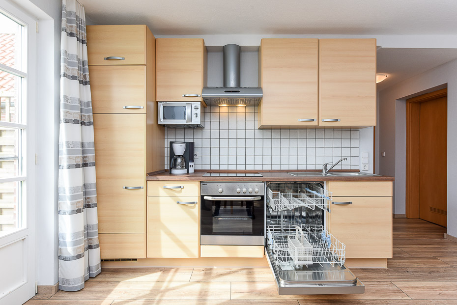 Ferienwohnung „Kuhstall“ - Wohnzimmer mit integriertem Küchenbereich