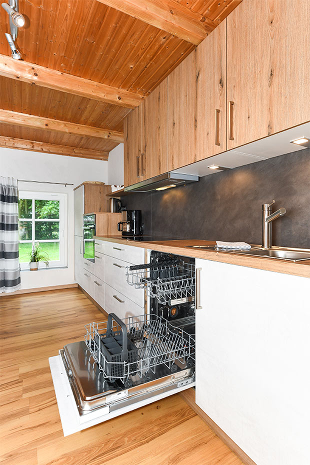 Ferienwohnung „Melkstall“ - Wohnzimmer mit integriertem Küchenbereich