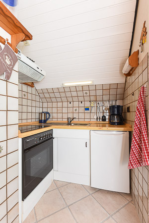 Ferienwohnung „Weitblick“ - Wohnzimmer mit integriertem Küchenbereich